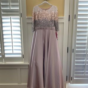 Beaded ball gown with pockets. Size 12. Never worn. $250.